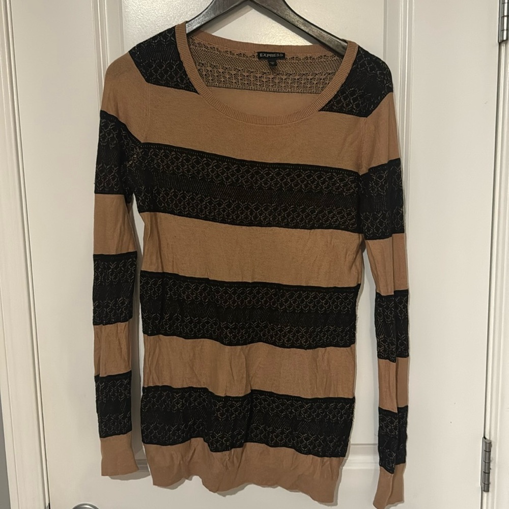 Brown and black striped tunic length sweater.